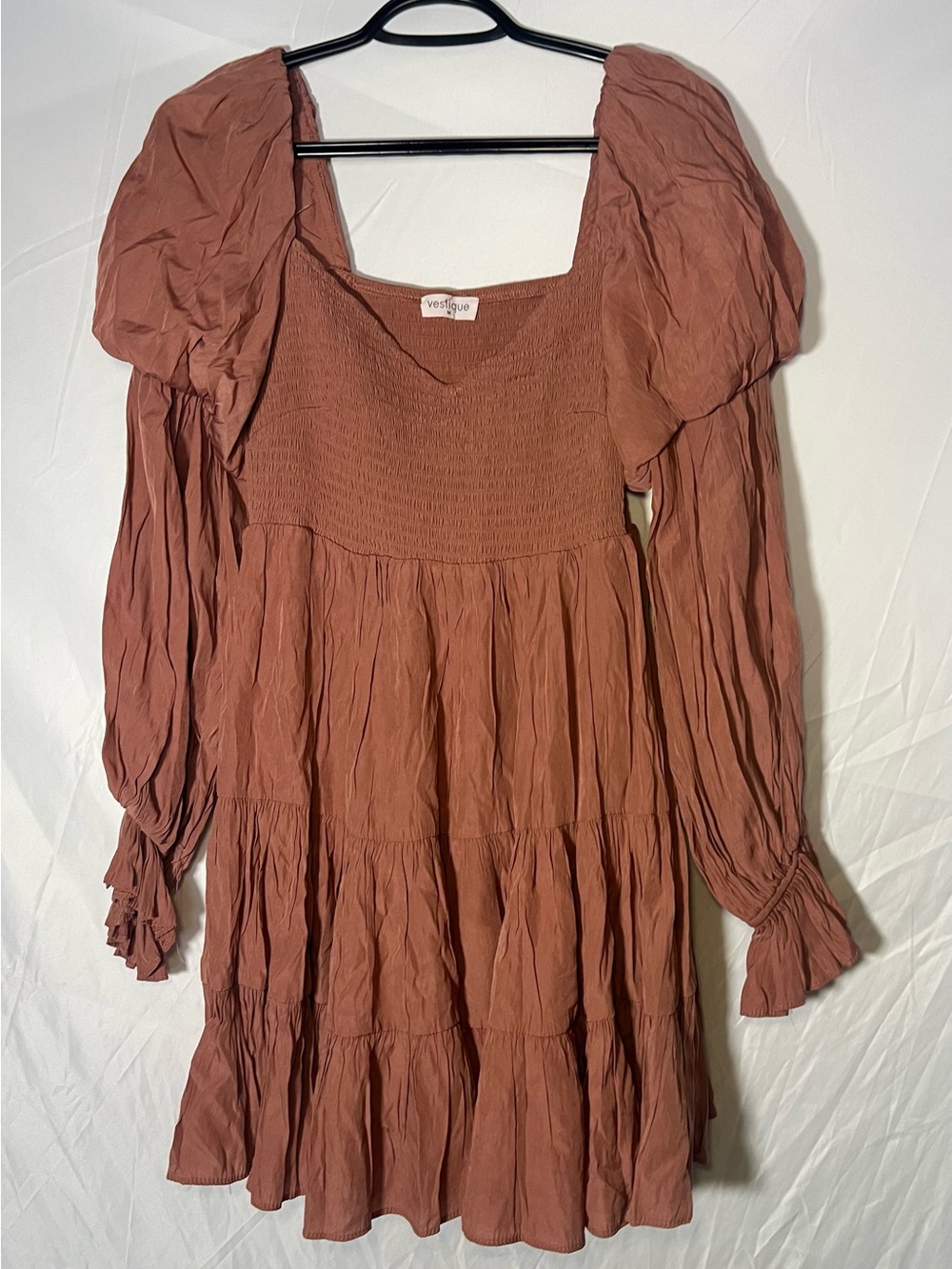 vestique rust tiered smocked mini dress with puff sleeves